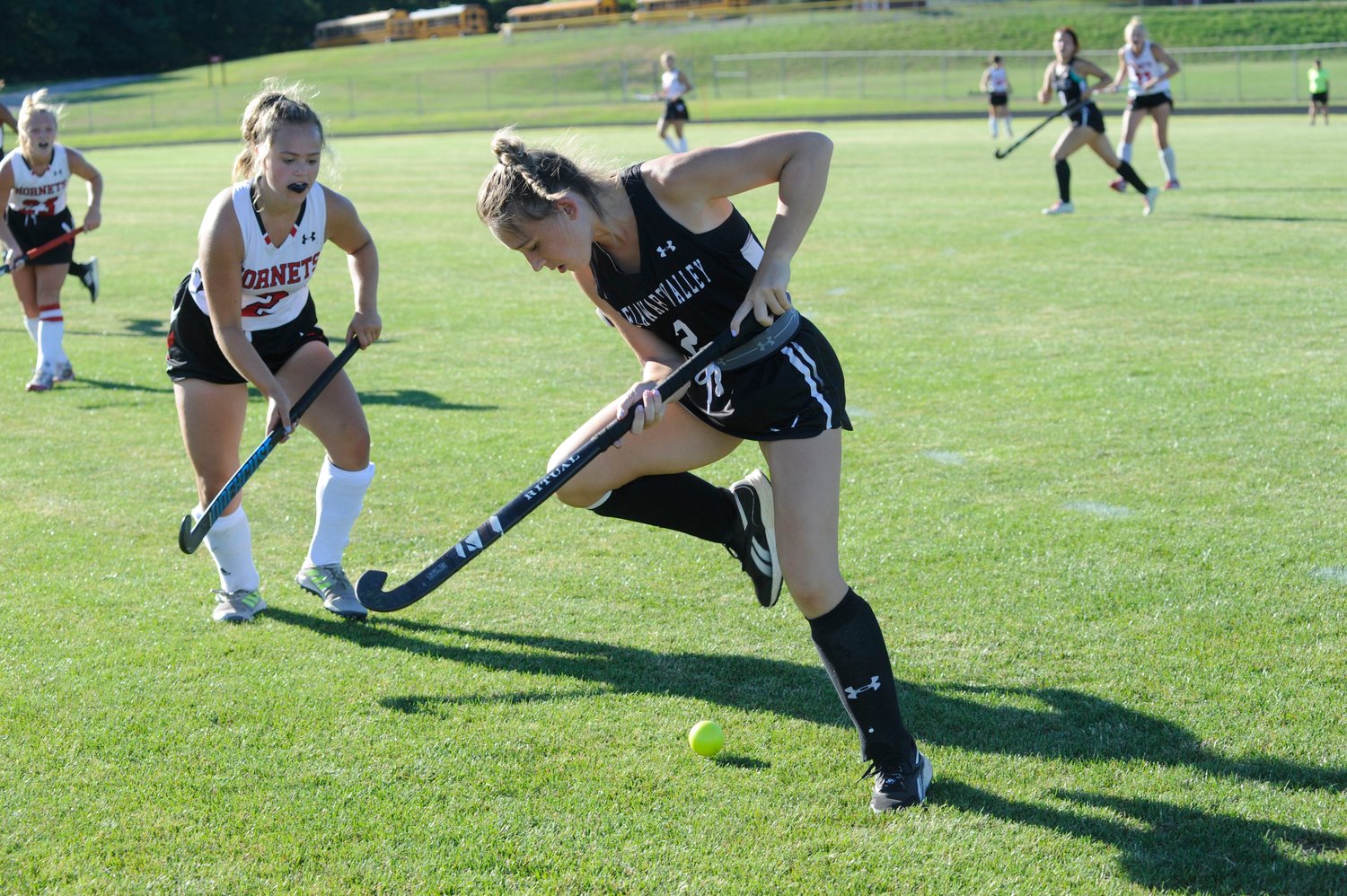 Hot-footin’ field hockey. Delaware Valley’s Ava O’Grady shows off a few improvised dance moves on the green as Honesdale’s Jillian Hoey closes in on the play...